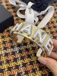 Chanel Monogram Gold Bangle Bracelet