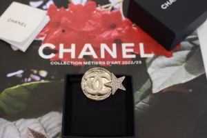 Chanel Gold CC Round Star Brooch