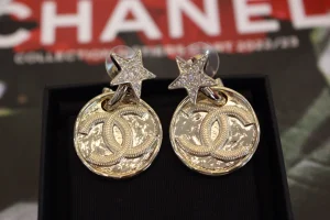 Chanel Gold CC Round Star Earrings
