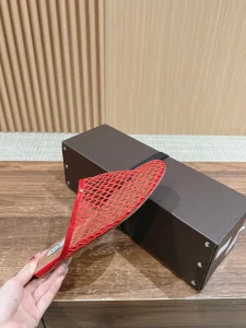 Alaia Red Fishnet Flat Mules